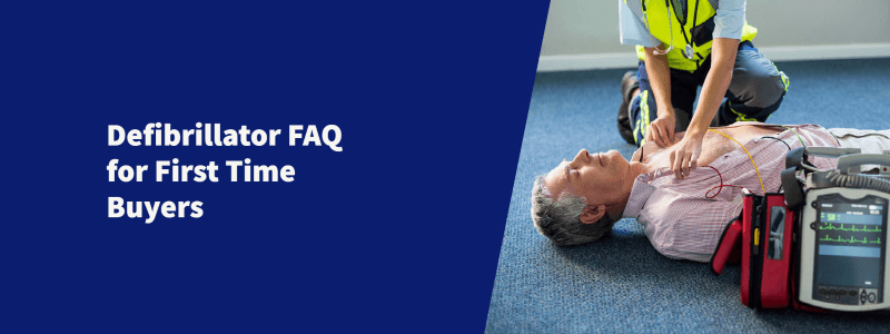 title image for defibrillator faq for first time buyers blog, with title on the left and a man getting cpr from a paramedic using a defib on the right